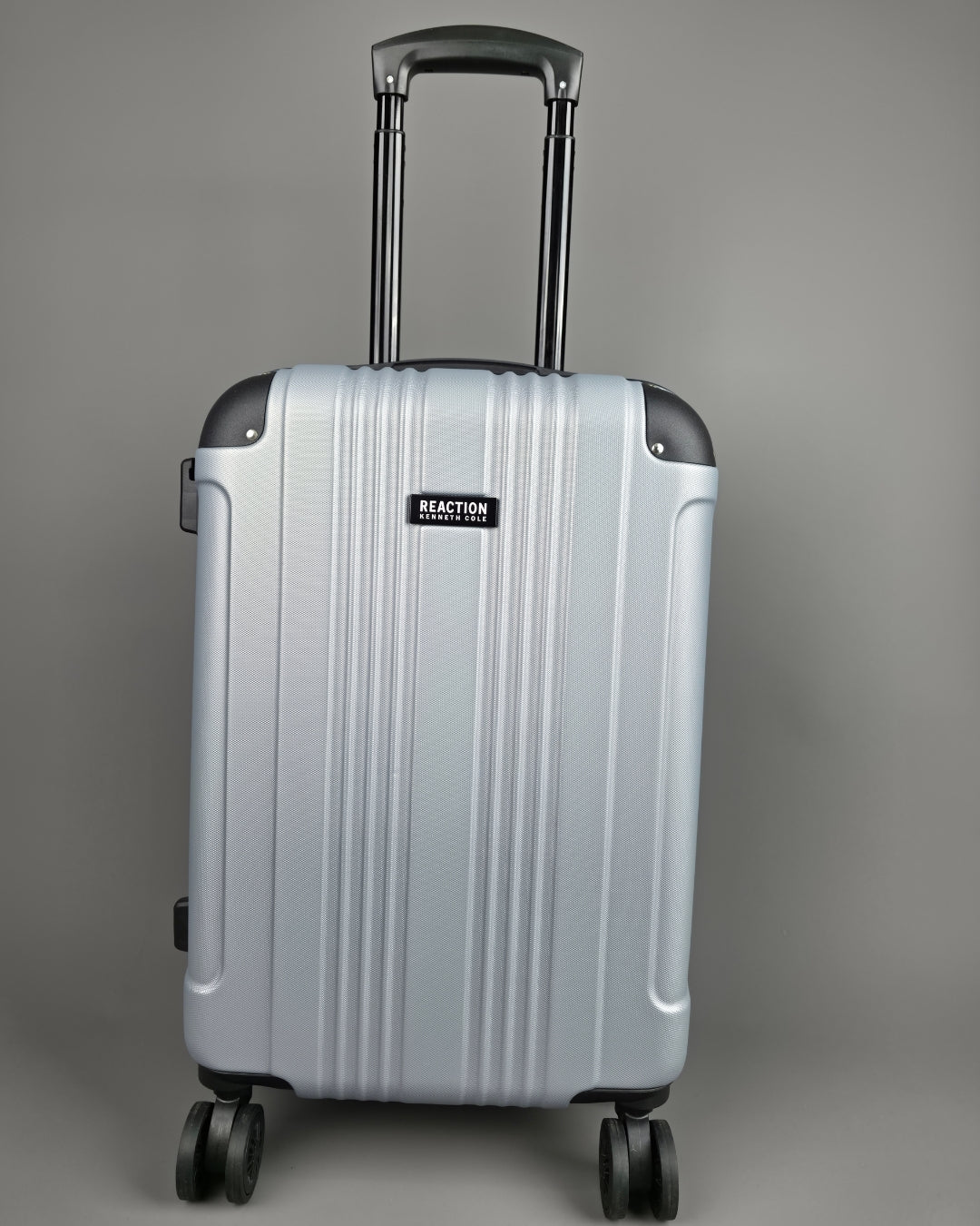 MALETA CARRY ON KENNETH COLE PLATEADA