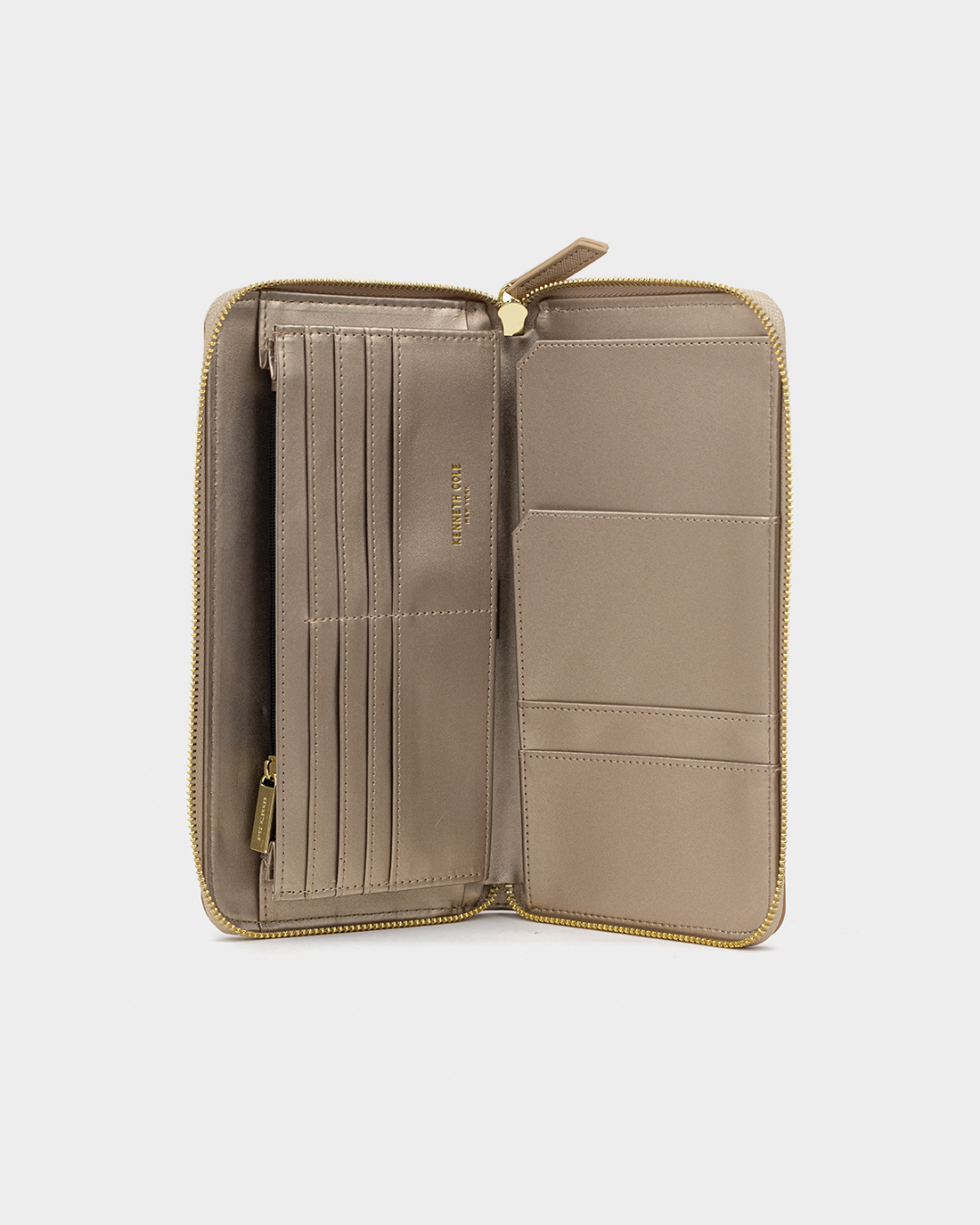 CARTERA KENNETH COLE DORADA PARA DAMA
